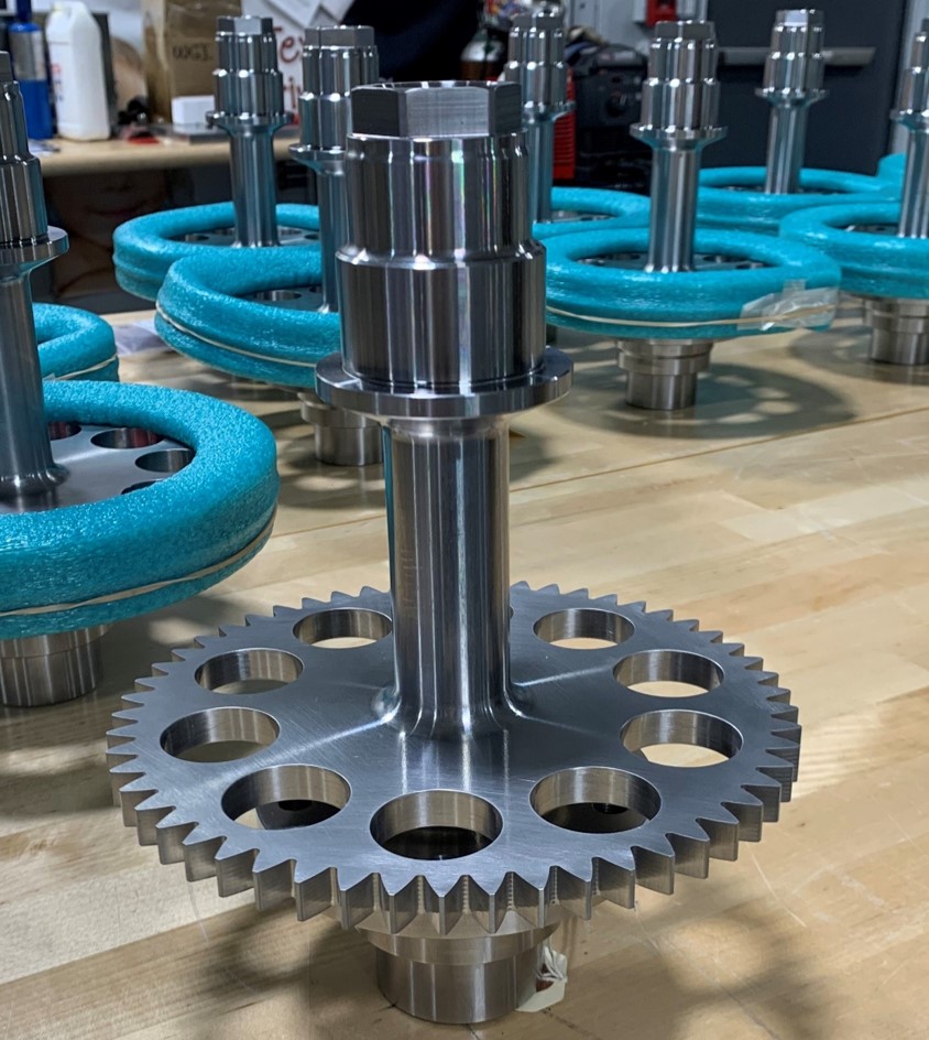 Blue gears and metallic machinery