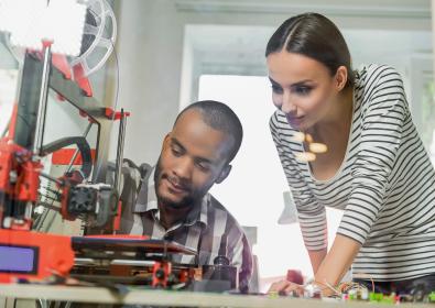 Man and Woman at a 3D Printer
